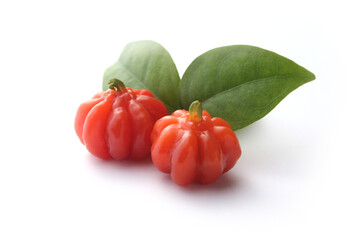 Portion of tropical pitanga fruit on a white background