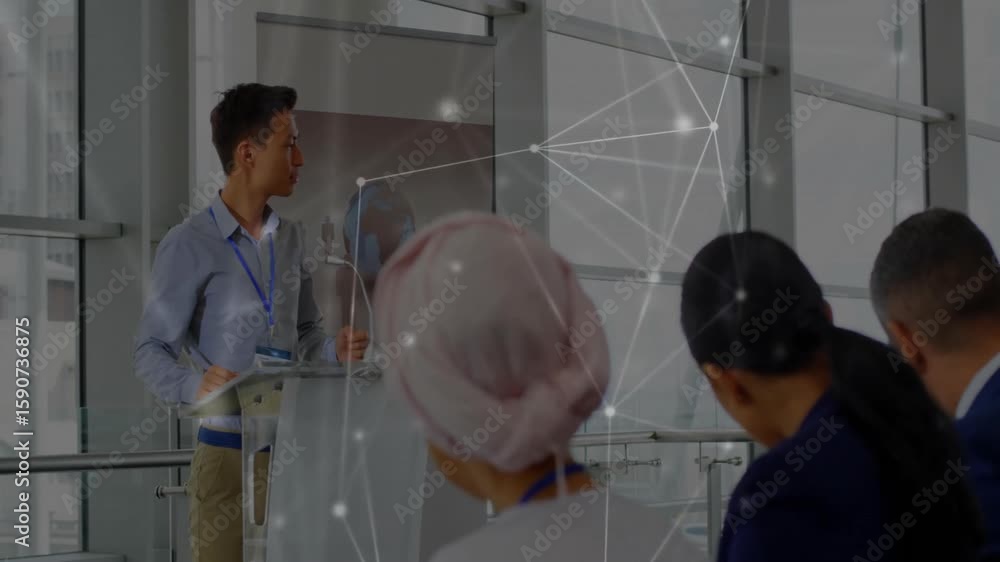 Aufkleber presenter tapping remote presenting network slide in boardroom with pulsing overlay through glass