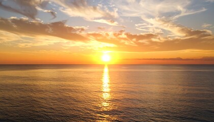 Naklejka premium Dramatic sunset over the ocean