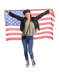 Beautiful young woman with USA flag on white  background