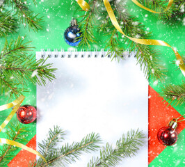 Christmas decorations, wish list, Christmas tree branches. Snowing. Happy New Year, copy space, flat lay