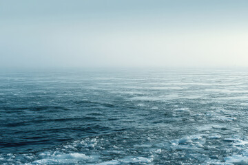 Fototapeta premium captivating aerial view of tranquil ocean waters showcasing their stunning colors and patterns