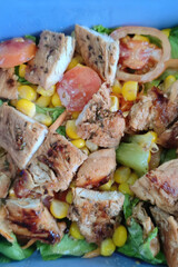 Healthy Grilled Chicken Salad with Corn and Tomato in a Lunch Box