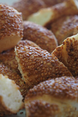Freshly baked sesame bread rolls ready to serve