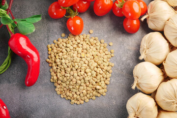 Veggies and lentils on kitchen countertop