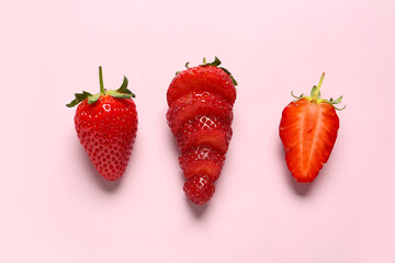 Sweet fresh strawberries on pink background