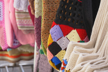 Handcrafted colorful textiles displayed at a local market