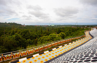The Al Faruq Grand Mosque, seen from a distance with the surrounding government center, is the largest mosque in Sangatta, East Kutai Regency, East Kalimantan, and is also an Islamic center.