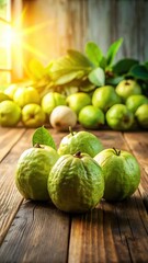 Fresh guava fruit arranged artfully on a wooden floor with natural light shining through