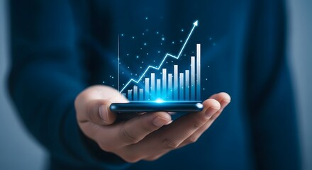 Digital Growth: Hand holding smartphone displaying rising financial chart with upward trending arrow and data visualization. Technology finance.