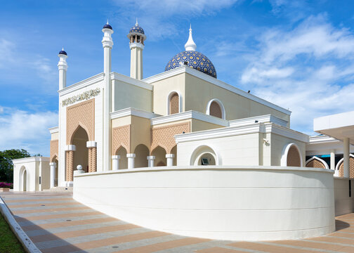 Brunei International Airport Mosque, in Bandar Seri Begawan, with its intricate design and expansive entrance under azure sky