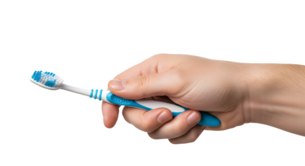 Hand holding a blue and white toothbrush with soft bristles.
