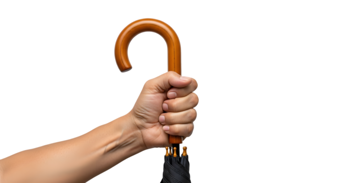 Hand gripping a woodenhandled umbrella showcasing texture and detail of the umbrellas folded canopy.
