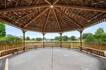 Peaceful Pond View from Under a Covered Pergola