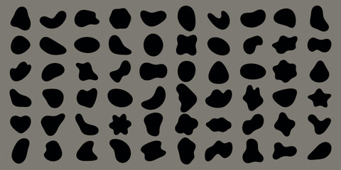 Abstract shapes on a background. Organic shapes, varied forms, and unique patterns. Repeated abstract shapes create a modern, artistic look. Black shape vector set.