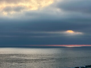 Fototapeta premium Sunset Hole in Clouds