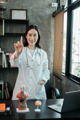 Female doctor using virtual interface in a modern medical office, showcasing technology in...