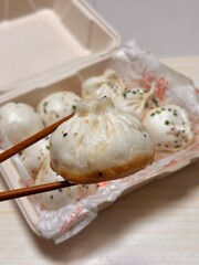Jjinppang, soft and fluffy steamed buns filled with sweet red bean paste or savory fillings. A...