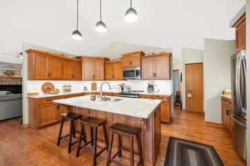 Bright modern kitchen with sleek island and stainless steel appliances