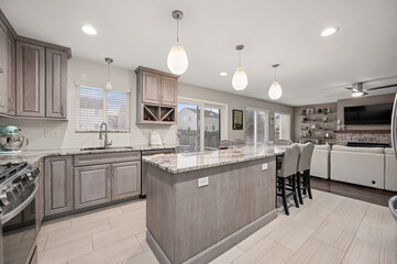 Bright modern kitchen with sleek island and stainless steel appliances
