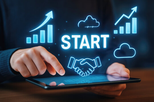 Glowing blue startup growth charts handshake and word start over tablet business