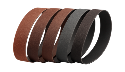 Variable grit sanding belt set for use with a portable belt sander in a home garage.