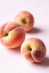 Fresh peaches on pink background, Summer fruit