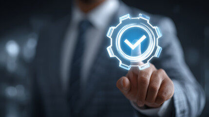 Businessman pointing at glowing checkmark icon inside gear symbol, concept of quality assurance and success