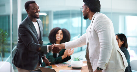 Handshake, meeting and business people for partnership, deal or thank you in office. B2B merger,...