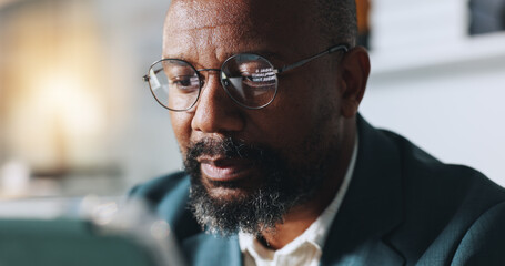 Business, glasses and black man with tablet, reflection or risk management with economy report....
