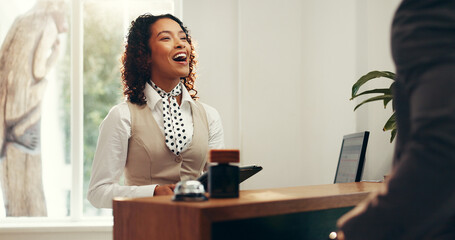 Hotel, concierge and woman with customer at front desk for reservation, booking room and check in....