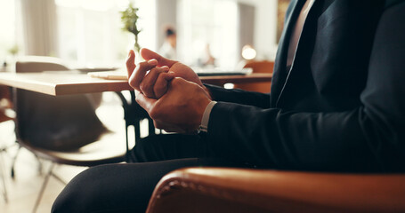 Hands, pain and business man with injury, fibromyalgia and muscle inflammation in office lobby....