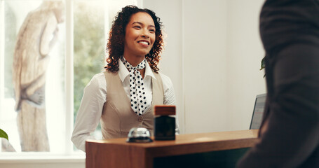 Hotel, concierge and woman with person at front desk for reservation, booking room and check in....