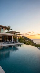 Fototapeta premium Luxurious villa with infinity pool overlooking the ocean at sunset tranquility
