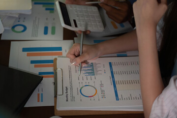 Budget Planning and Financial Analysis in Team Meeting