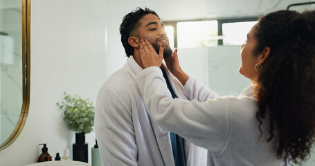 Skincare, cream and love with couple in bathroom for beauty, morning routine and diy spa. Facial treatment, self care and cosmetics with man and woman in home for collagen, dermatology and lotion