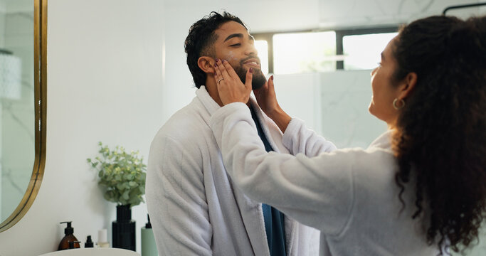Skincare, cream and love with couple in bathroom for beauty, morning routine and diy spa. Facial treatment, self care and cosmetics with man and woman in home for collagen, dermatology and lotion - Powered by Adobe