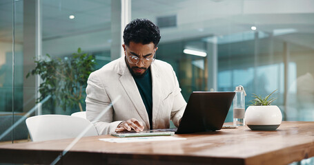 Businessman, laptop and tablet for planning, feedback and schedule in office. Employee, HR manager...