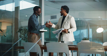 People, meeting and handshake with documents in office for hiring, onboarding and agreement. Men,...