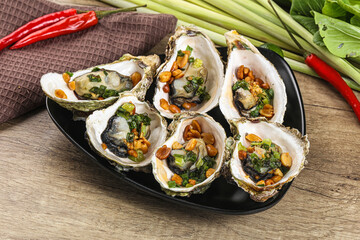 Baked oysters with green onion