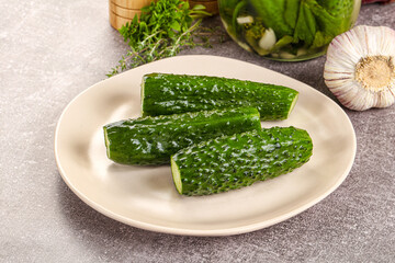Homemade lighty salted cucumbers with herbs