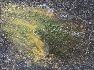 Abstract green and yellow texture resembling a landscape in grayscale  
