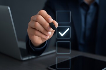 Businessperson completing digital checklist on laptop. Concept of productivity and task management. Useful for project planning, organizational strategy, and corporate efficiency visuals.