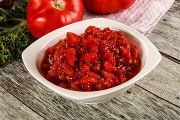 Diced ripe tomato with sauce