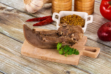 Steamed pork tongue with mustard