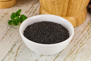 Black dry Nigella seeds in the bowl