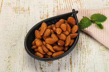 Tasty ripe almond nuts heap