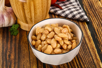 Baked white canned beans in the bowl
