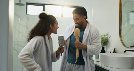 Couple, dance and karaoke in bathroom with love, energy and excited with morning routine. Singing,...