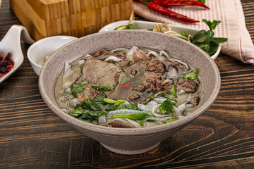 Vietnamese Pho Bo soup with beef and noodles